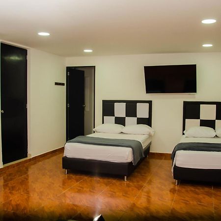 Casa Hotel Los Arboles Bello Bagian luar foto