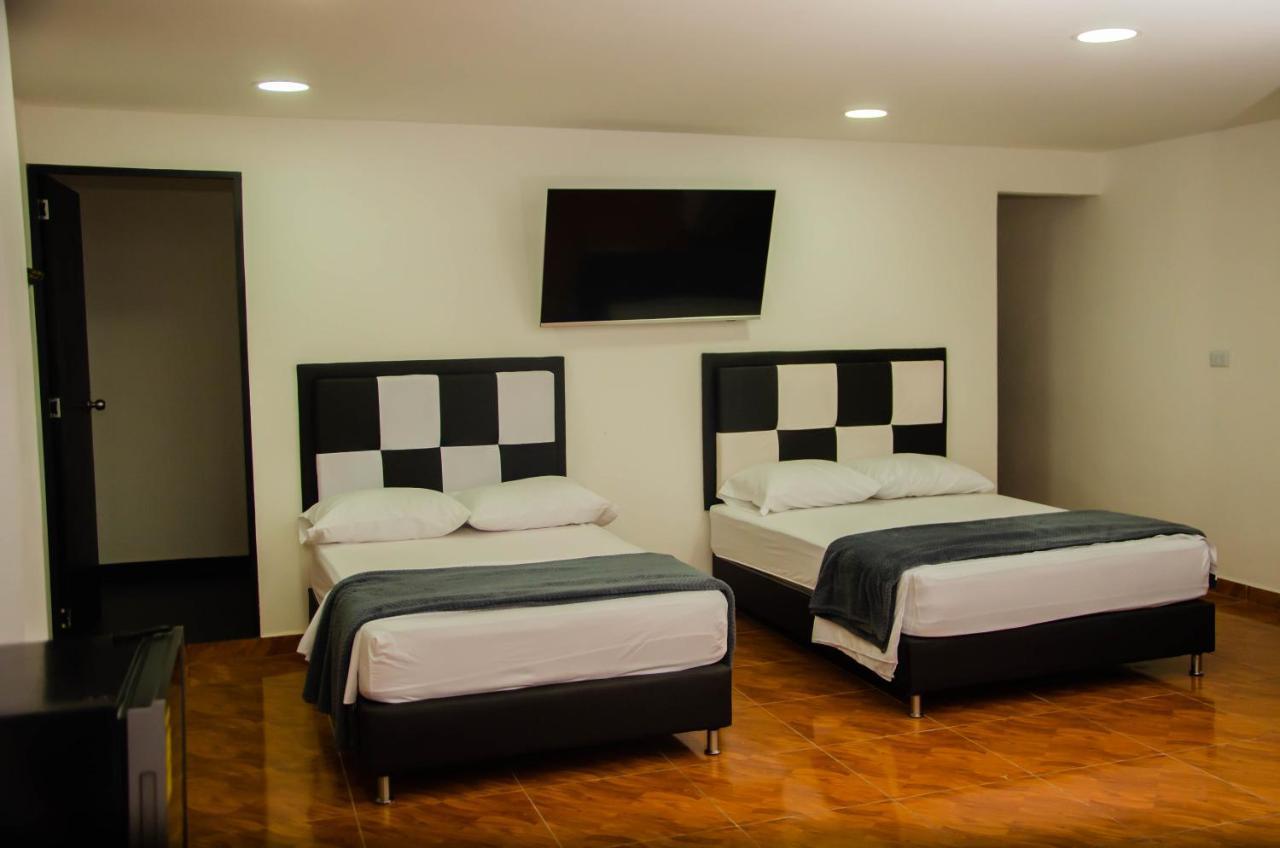 Casa Hotel Los Arboles Bello Bagian luar foto