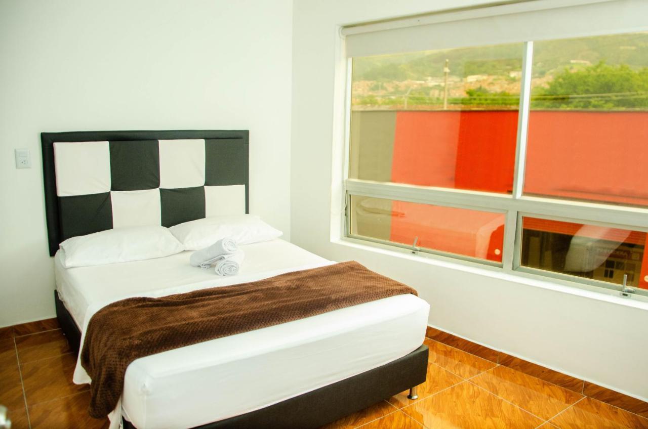 Casa Hotel Los Arboles Bello Bagian luar foto