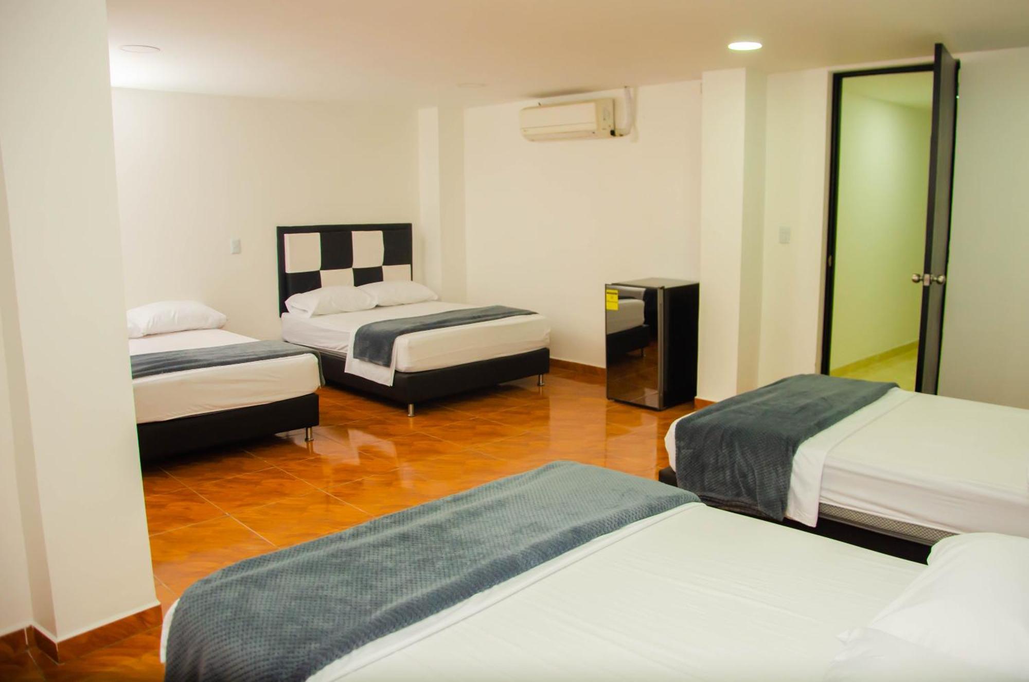 Casa Hotel Los Arboles Bello Bagian luar foto