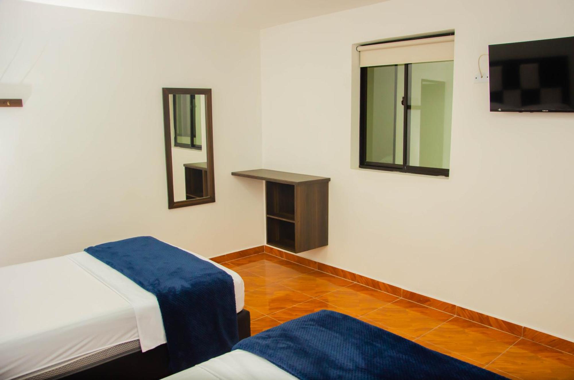 Casa Hotel Los Arboles Bello Bagian luar foto
